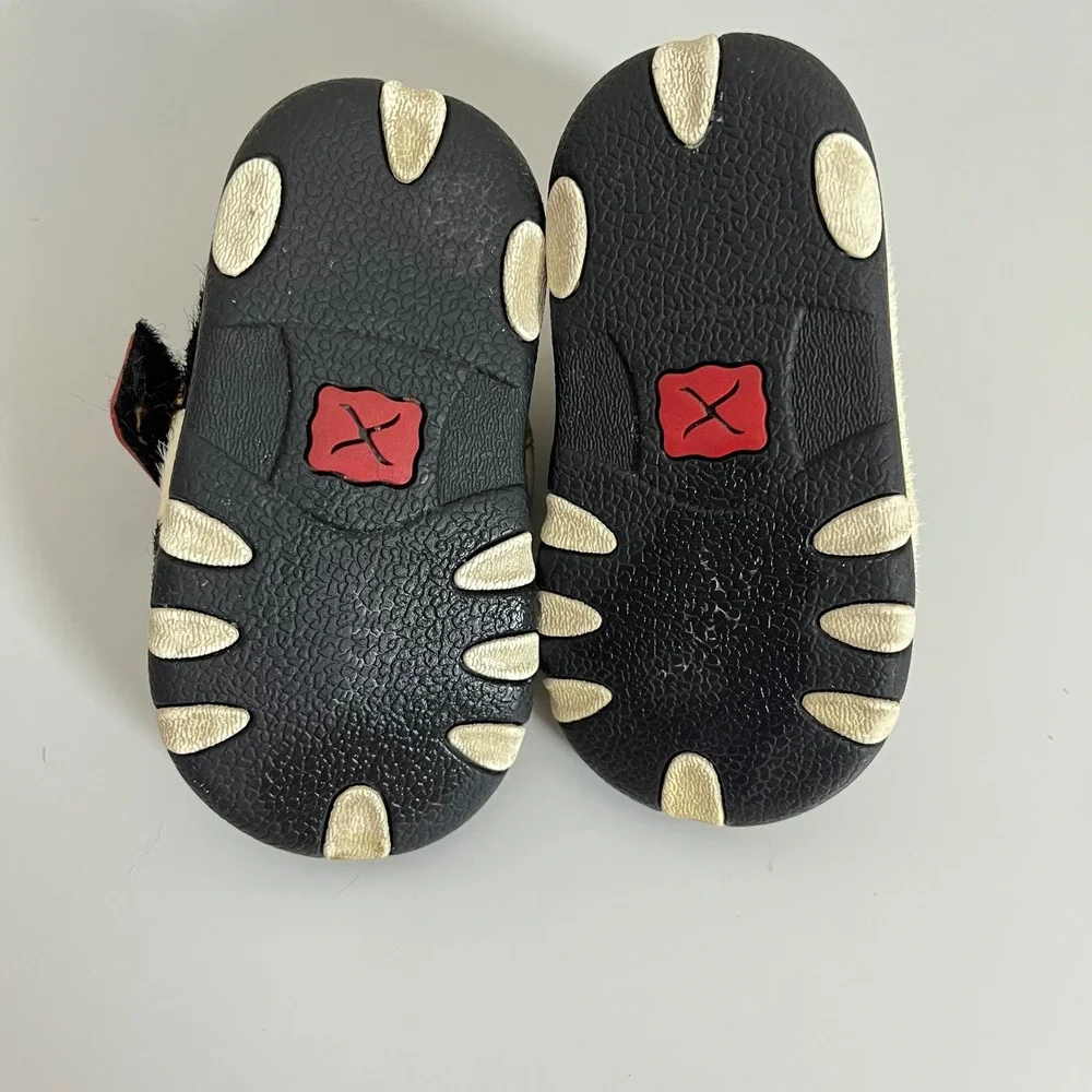 Twisted X Kids Cow Print Moccasins in Black and White